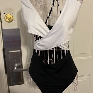 Venus size 6 size 4 avail Black white one piece